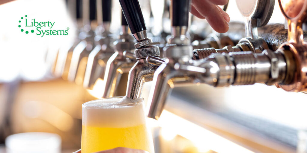 Pouring draft beer with the help of Liberty Systems